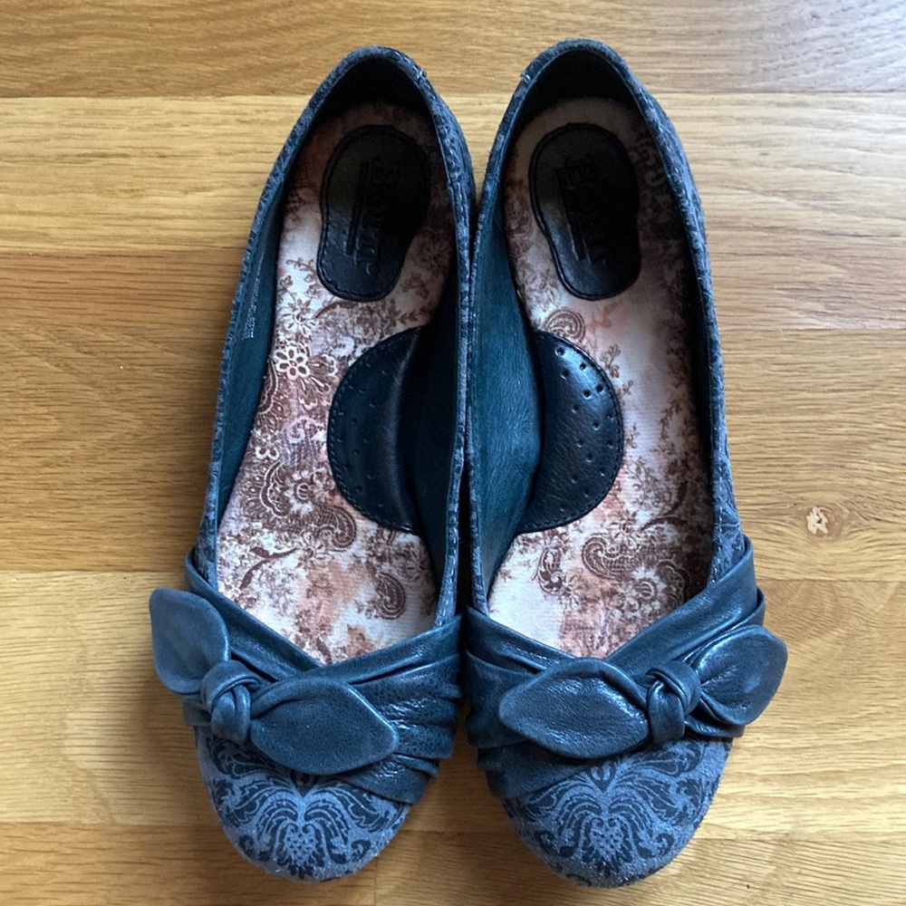Grey Born flats with embossed leather detail and bows. Size 7. Never worn.